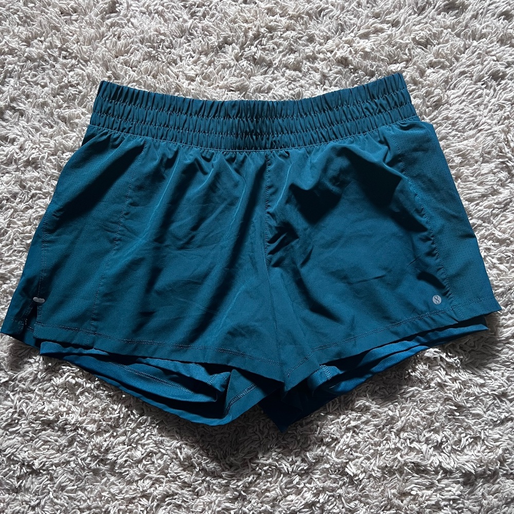 Teal running shorts